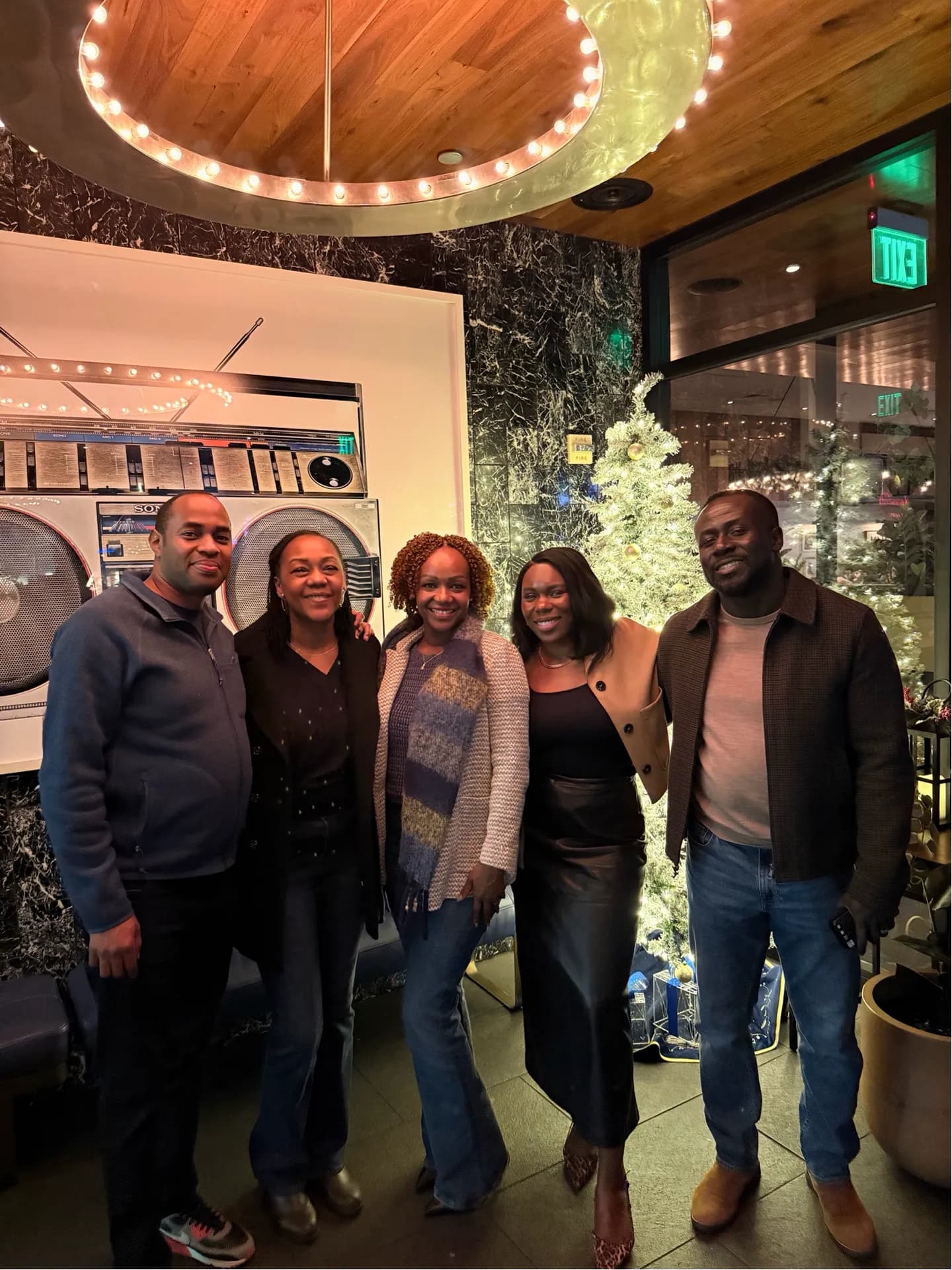Rose with friends at a stylish restaurant